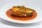 Sadine fish in tomato sauce,chili , lemon juice on white background