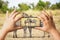 Safari concept. Tourist in Safari car looking at zebra couple and making photos with a mobile phone. Masai Mara national park,