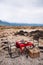 Safari outdoor picnic with African Tanzanian cuisine with baked Chapati nan flatbread on red table