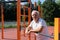 Safe Outdoor Exercises Older Adults senior man male summer, street workout physical Strength activity Calisthenics Park