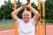 Safe Outdoor Exercises Older Adults senior man male summer, street workout physical Strength activity Calisthenics Park