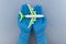 Safe travels concept. Plane in hands in medical gloves. Safety flight and travel during quarantine and lockdown.