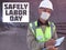 Safely Labor Day. Construction worker dressed in medical mask, uniform and white hardhat stands with clipboard at metro tunnel