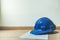 Safety blue helmet and home construction plan, architecture or construction or industrial equipments, with copy space