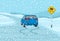 Safety car driving at winter season. Blue suv car is reaching the icy road. Slippery, wet roadway warning sign.