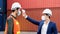 Safety of engineering team or foreman Have a helmet, Body thermometer to healthy while working and mask in factory or container.