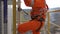 Safety equipment for climbing industrial installation, harness on gliding rail
