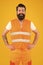 Safety equipment concept. Safety apparel for construction industry. Bearded brutal hipster safety engineer. High