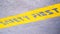 Safety first yellow label floor sign symbol on grey metal texture