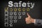 Safety five 5 star rating. thumbs up service golden rating stars on chalkboard