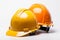 Safety gear yellow and orange helmet isolated for construction engineers