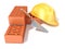 Safety helmet with rectangular perforated bricks and trowel