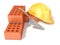 Safety helmet with round perforated bricks and trowel. 3D rend