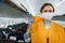 Safety instructions. Young stewardess on the work in the passanger airplane