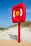 Safety life buoy in red case on the beach