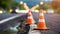 Safety orange cones. Plastic traffic cone. Road maintenance work