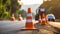 Safety orange cones. Plastic traffic cone. Road maintenance work