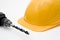 Safety yellow helmet and drill for workers