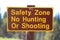 A Safety Zone, No Hunting or Shooting sign