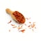 saffron spice wooden spoon on white background