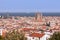 Sagrada Familia and The Torre Glories, formerly known as Torre Agbar with Barcelona and the sea on the background