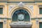 Saigon Central Post Office above the entrance, with the clock and fretwork