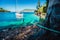 Sail boat docked alone in emerald hidden lagoon among picturesque mediterranean nature Ionian Islands, Greece