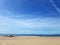 Sail boat on ocean beach