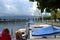 Sail boats on trailers, Rapperswil Jetty, clouds and hills on the horizon