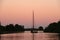 Sail ship at evening sunset on waters of Eernewoude in Friesland