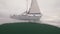 Sail yacht sailing in sea waterline view. Underwater view sailing yacht in ocean