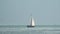 Sailboat with 2 people on board on Leman lake near Vevey Switzerland