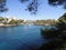 Sailboat anchored in natural harbor