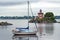 Sailboat Anchored Near Pomham Rock Lighthouse in Rhode Island