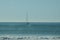 Sailboat anchored offshore