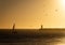 Sailboat Approaches Farol do Pontao at Dusk