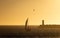 Sailboat Approaches Farol do Pontao at Dusk