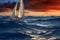 Sailboat basks in the ethereal glow of a beautiful sunset