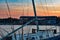 Sailboat and Bayside Stadium on colorful sunset background at Seaworld in International Drive area.