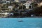 Sailboat With The Beach And The Luxury Houses of The City of Roquebrune-Cap-Martin in The Background