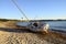 Sailboat Boat stranded on the beach after a storm