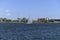 Sailboat in Boston Harbor set against the city shoreline