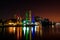 Sailboat In Brazilian Flag Colors at Night