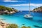 Sailboat in Calanques bay, Costa Brava, Catalonia, Spain, Beautiful beach with sailing boat yacht, Cala Macarelleta, Menorca