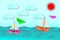 Sailboat and colorful plane gliders, and the sea with beautiful sky
