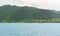 Sailboat with a colourful sail on an alpine lake