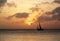 Sailboat Crossing at Sunset