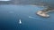 A sailboat cruising the ocean in Monte Argentario