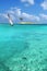 Sailboat In Crystal Clear Waters