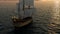 Sailboat at dawn on sea